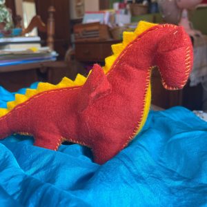 Handmade felt dragon for celebrating Michaelmas with children