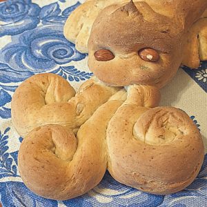Homemade dragon-shaped bread for a Michaelmas festival celebration